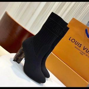 Louis Vuitton boot. Worn once, looks brand new.